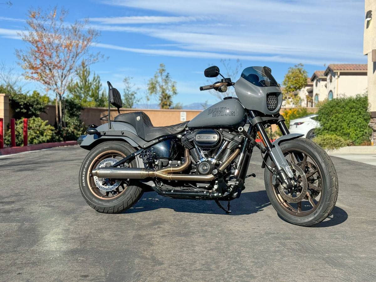 Stealth Pipes exhaust system installed on Harley M8 Softail – rear-side view of muffler and headers (2017–2025), photo 31 of 36